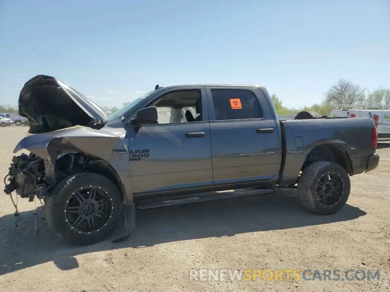 1 Photograph of a damaged car 3C6RR7KT5MG615049 RAM 1500 2021