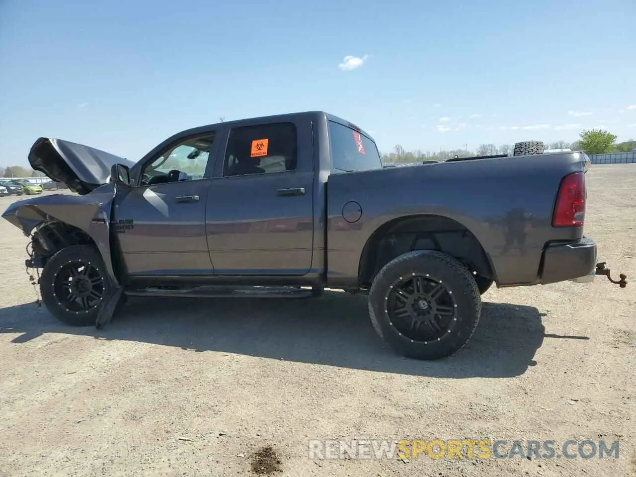 2 Photograph of a damaged car 3C6RR7KT5MG615049 RAM 1500 2021