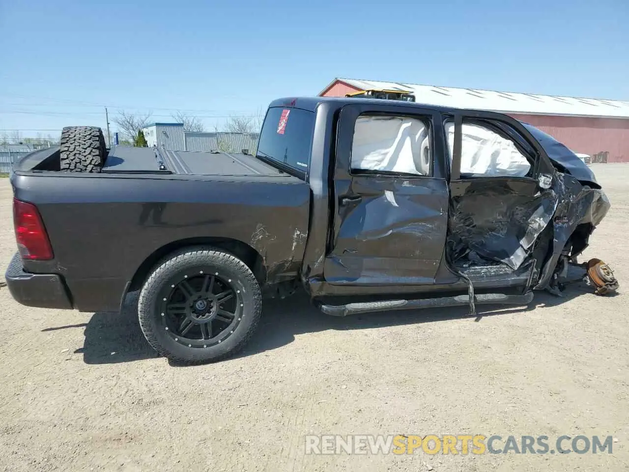 3 Photograph of a damaged car 3C6RR7KT5MG615049 RAM 1500 2021