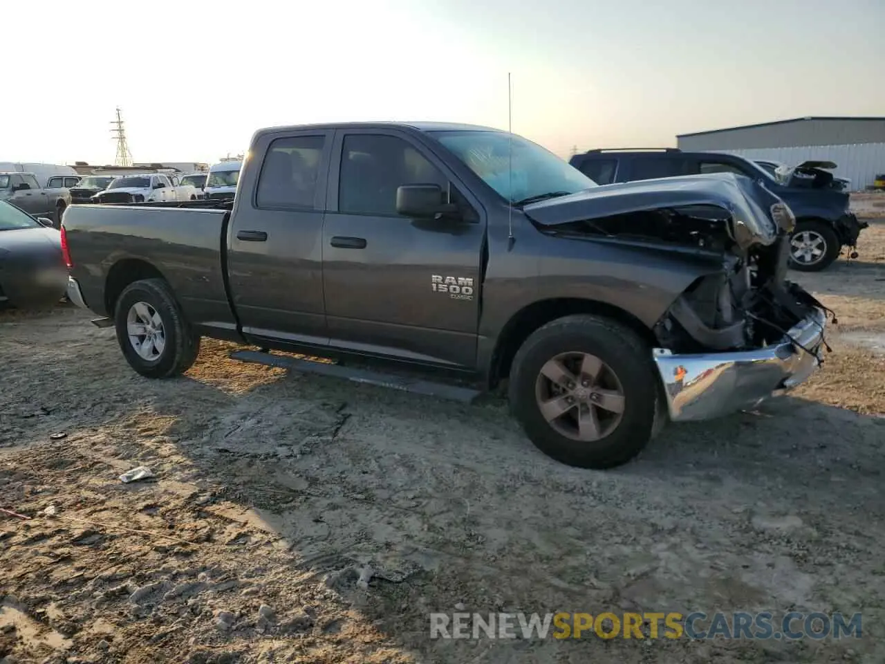 4 Photograph of a damaged car 1C6RR6FG1NS154952 RAM 1500 2022