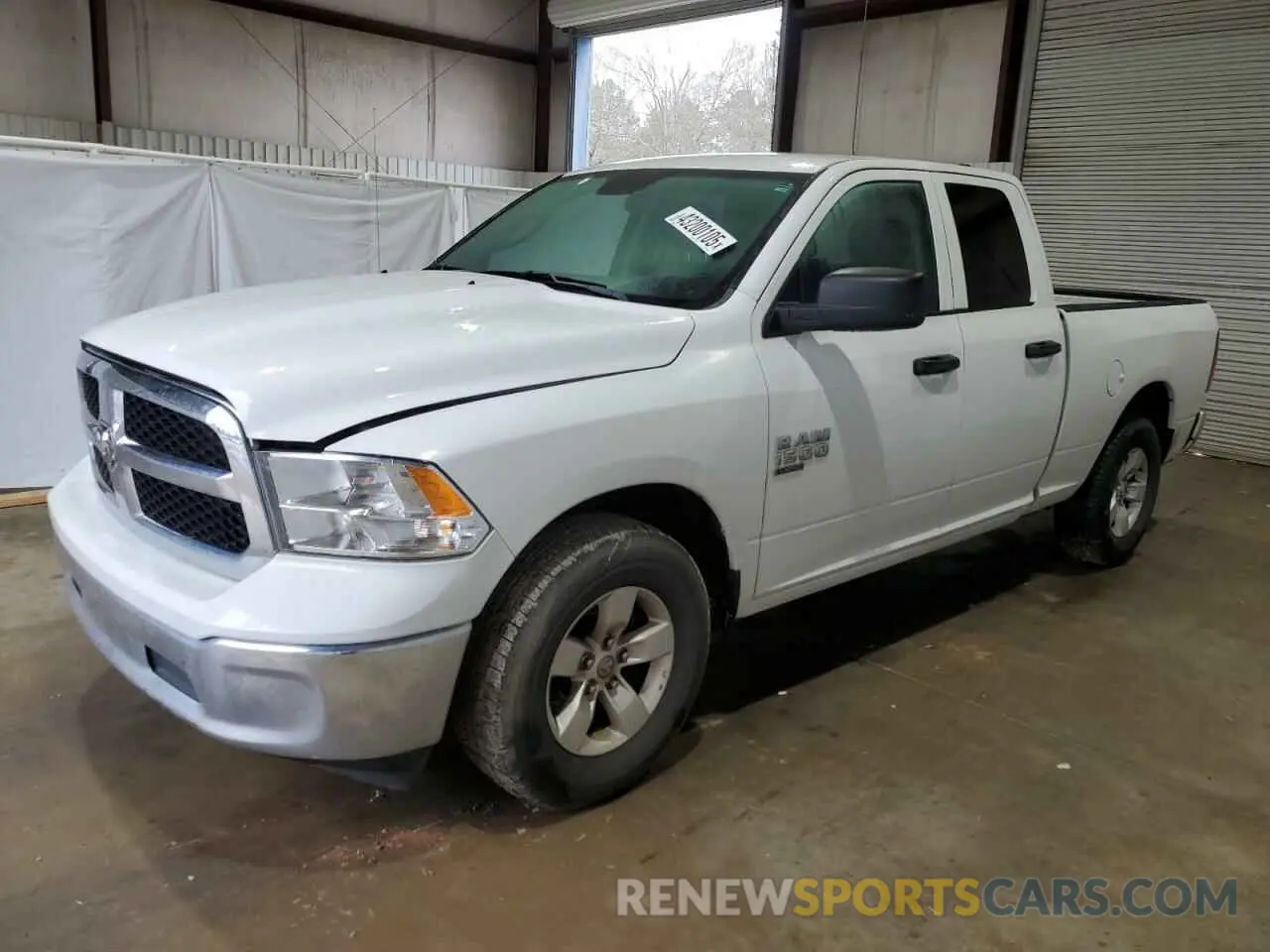 1 Photograph of a damaged car 1C6RR6FG3NS149350 RAM 1500 2022