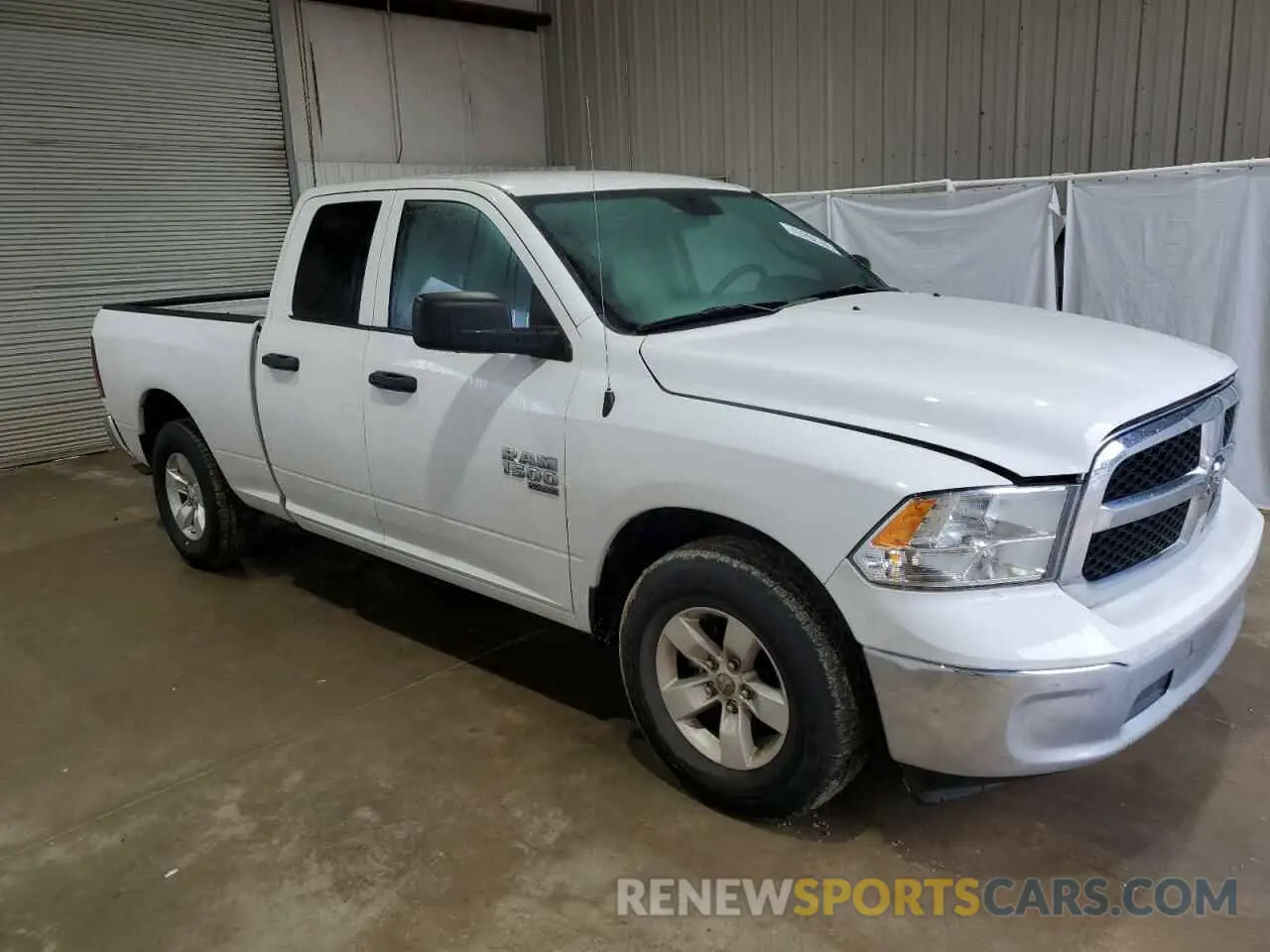 4 Photograph of a damaged car 1C6RR6FG3NS149350 RAM 1500 2022