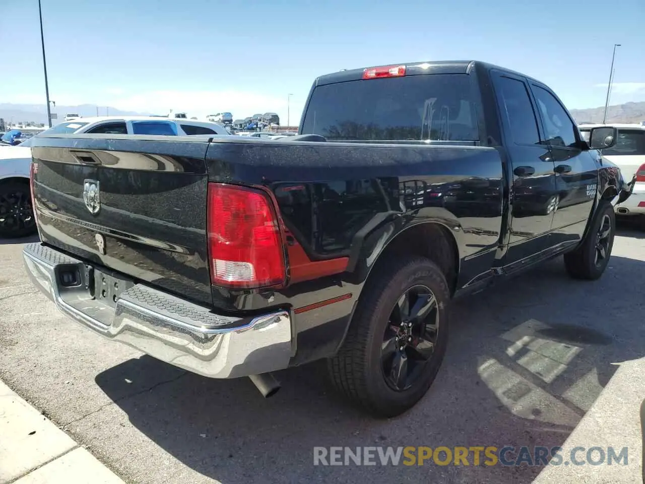 3 Photograph of a damaged car 1C6RR6FG7NS154972 RAM 1500 2022