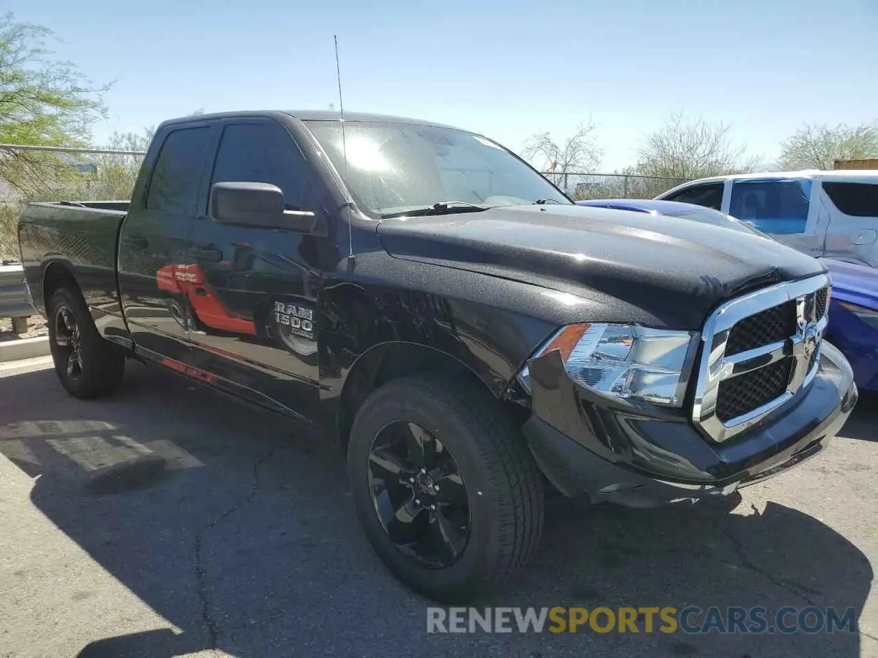 4 Photograph of a damaged car 1C6RR6FG7NS154972 RAM 1500 2022