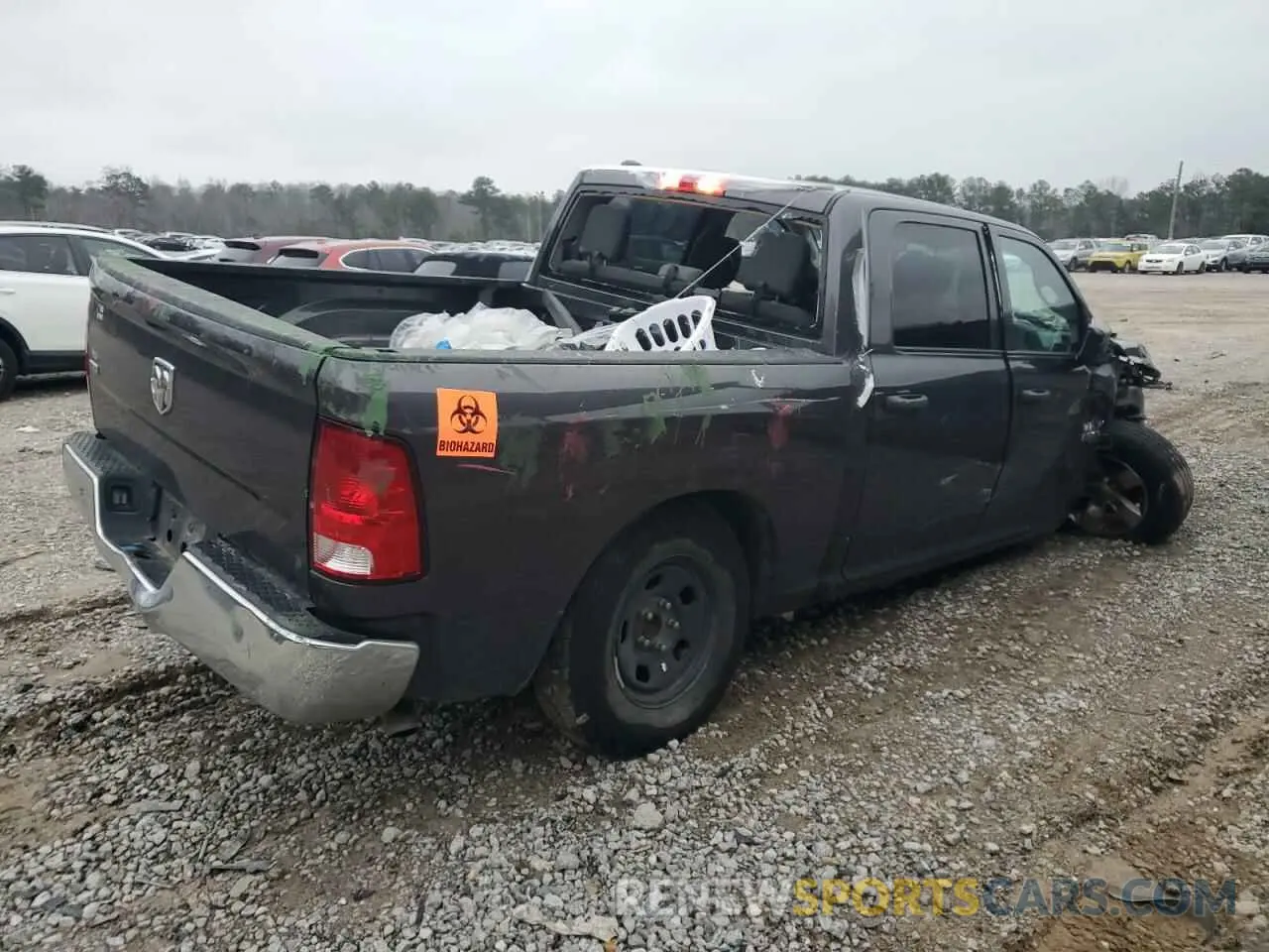 3 Photograph of a damaged car 1C6RR6LG7NS169721 RAM 1500 2022