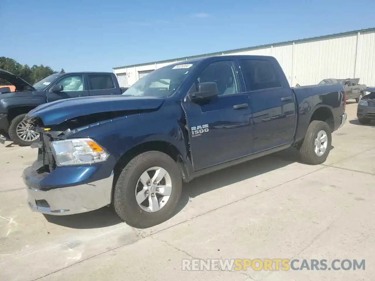 1 Photograph of a damaged car 1C6RR6LG9NS203321 RAM 1500 2022