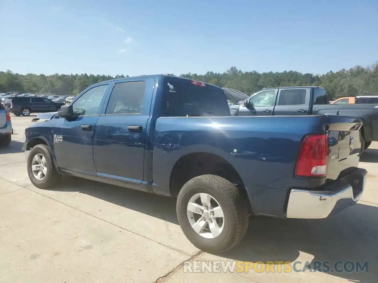 2 Photograph of a damaged car 1C6RR6LG9NS203321 RAM 1500 2022