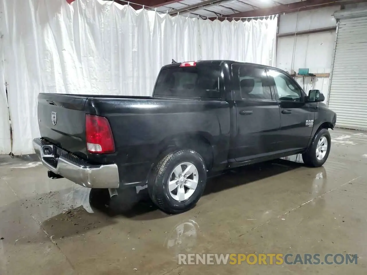 3 Photograph of a damaged car 1C6RR6LGXNS192569 RAM 1500 2022