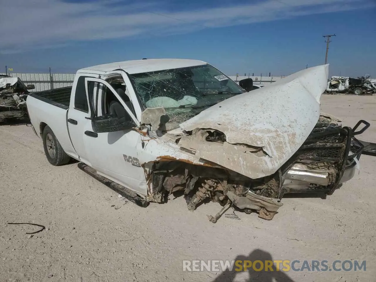 4 Photograph of a damaged car 1C6RR7FG0NS230358 RAM 1500 2022