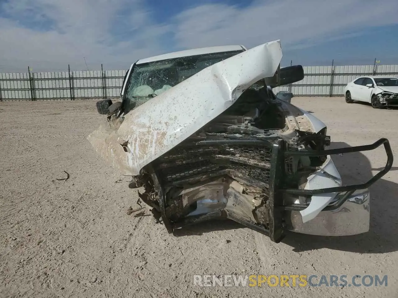 5 Photograph of a damaged car 1C6RR7FG0NS230358 RAM 1500 2022