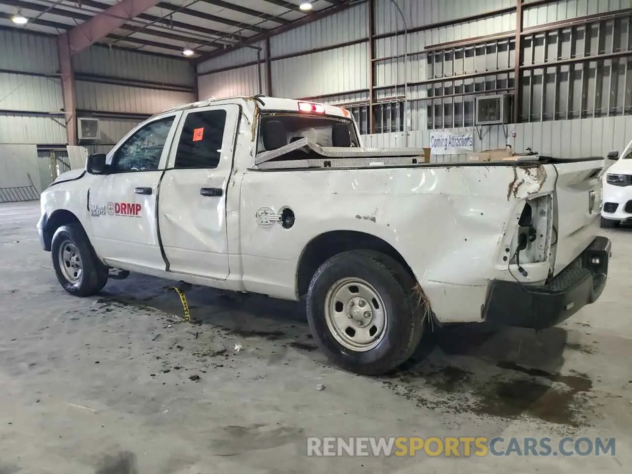2 Photograph of a damaged car 1C6RR7FG3NS183990 RAM 1500 2022