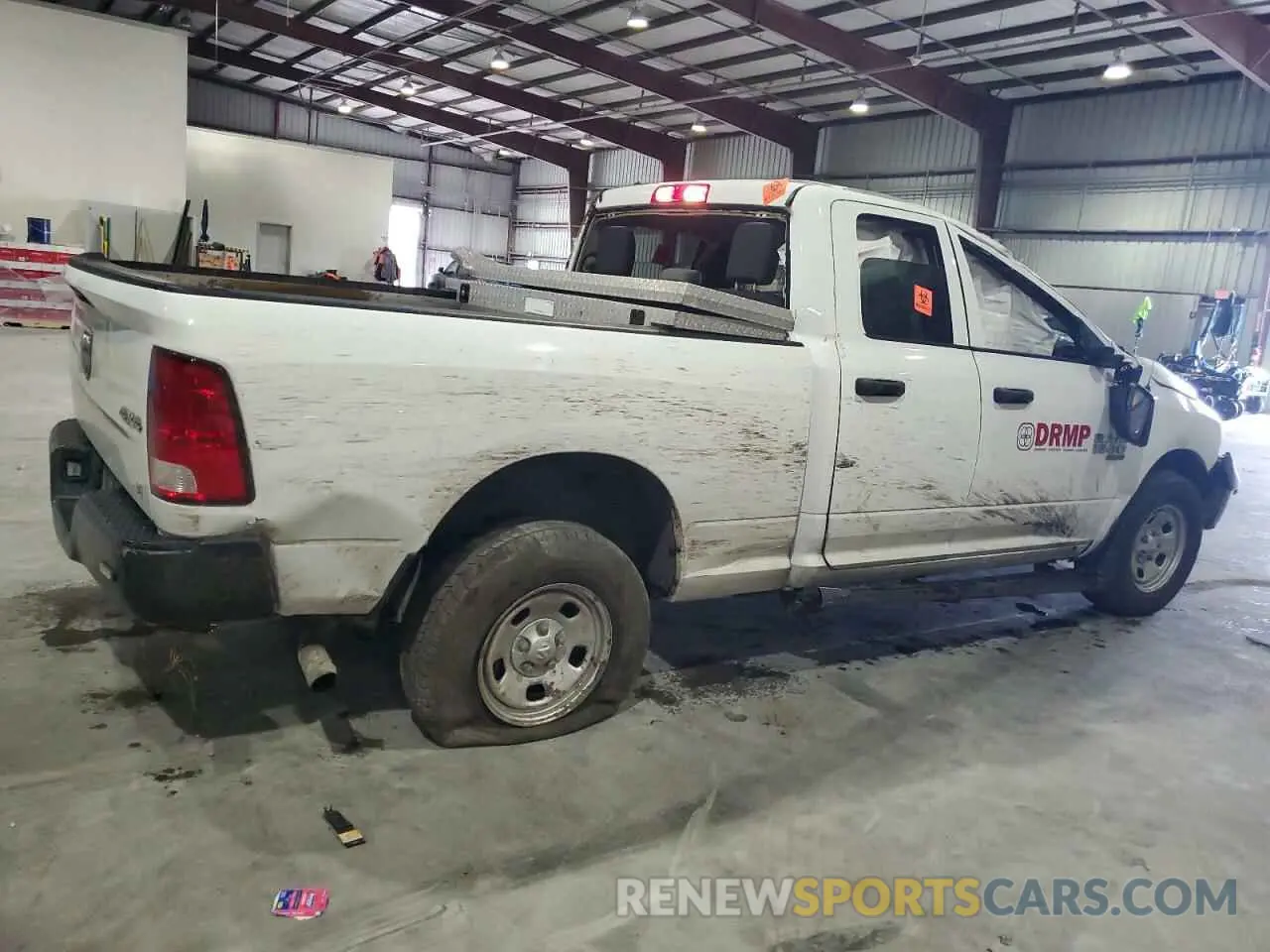 3 Photograph of a damaged car 1C6RR7FG3NS183990 RAM 1500 2022