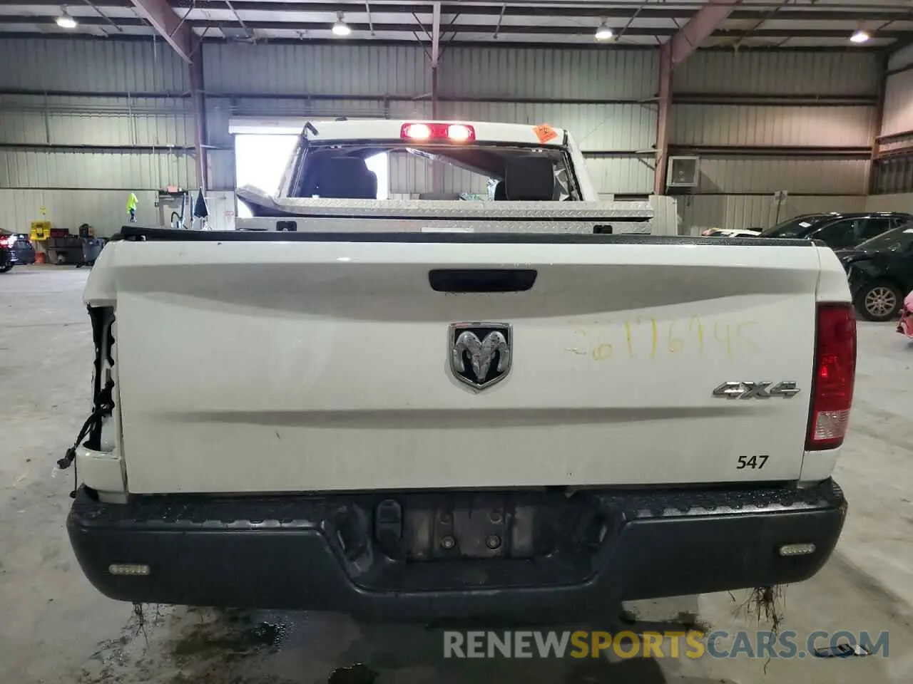 6 Photograph of a damaged car 1C6RR7FG3NS183990 RAM 1500 2022