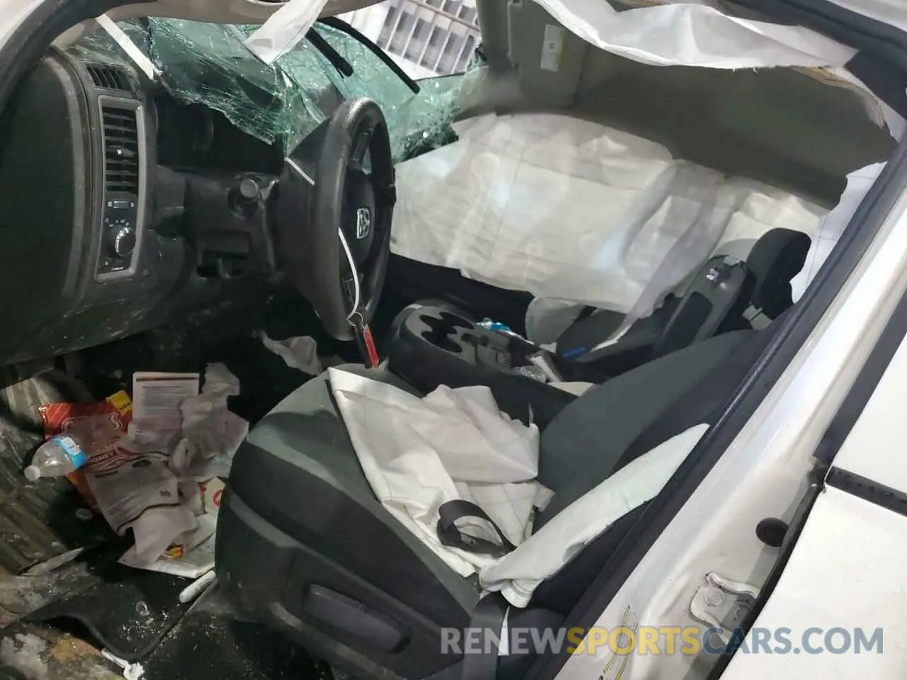 7 Photograph of a damaged car 1C6RR7FG3NS183990 RAM 1500 2022