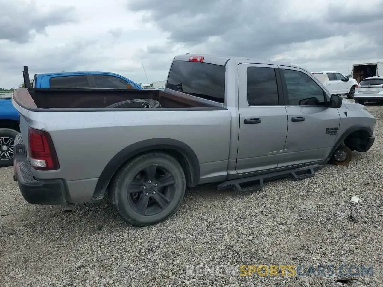 3 Photograph of a damaged car 1C6RR7GG1NS250102 RAM 1500 2022