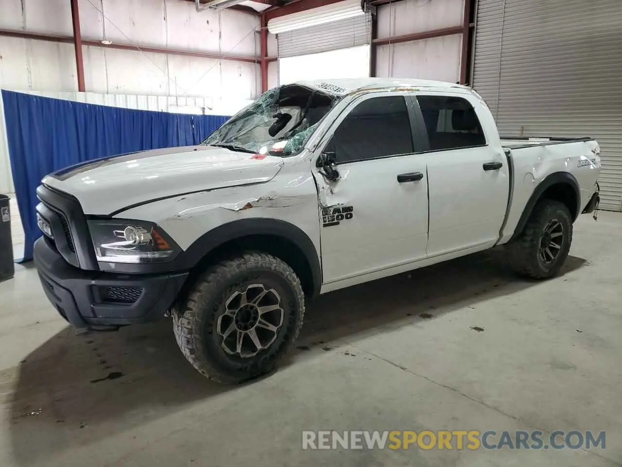 1 Photograph of a damaged car 1C6RR7LG3NS219729 RAM 1500 2022