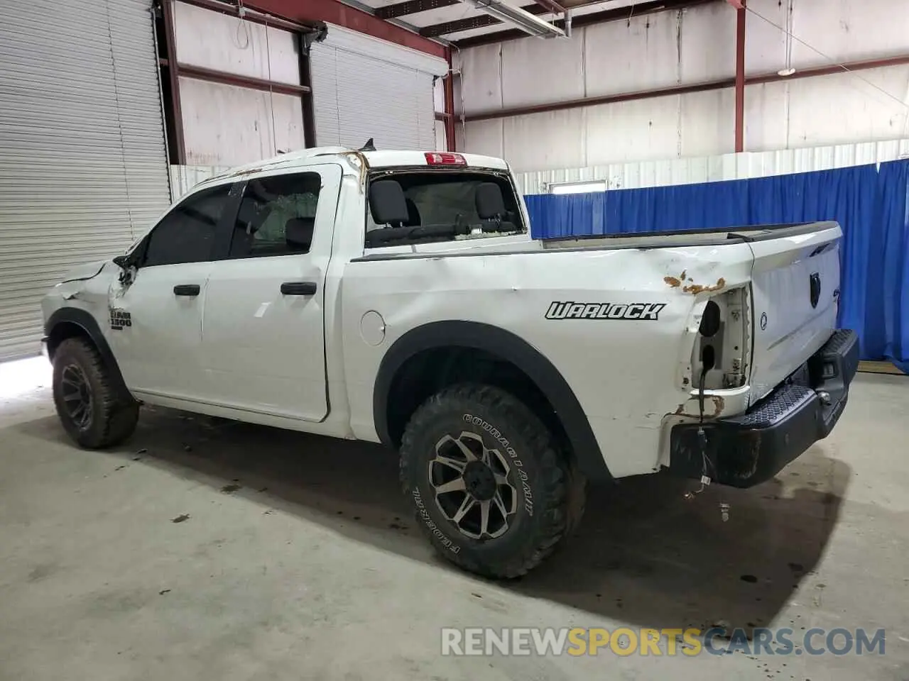 2 Photograph of a damaged car 1C6RR7LG3NS219729 RAM 1500 2022