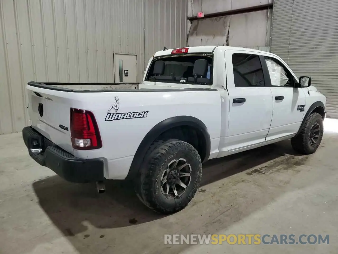 3 Photograph of a damaged car 1C6RR7LG3NS219729 RAM 1500 2022