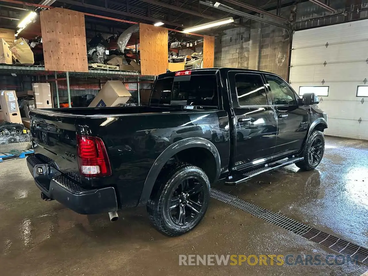 4 Photograph of a damaged car 1C6RR7LG4NS122586 RAM 1500 2022