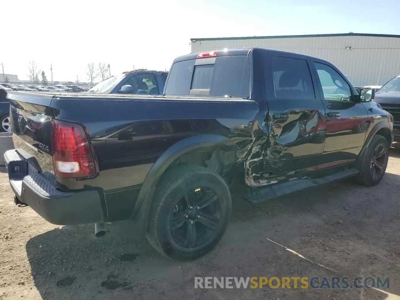 3 Photograph of a damaged car 1C6RR7LG6NS249940 RAM 1500 2022