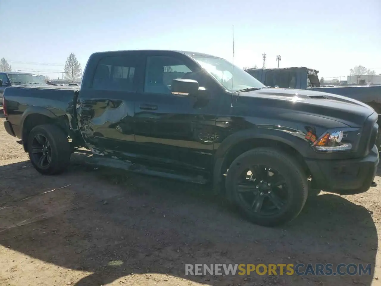 4 Photograph of a damaged car 1C6RR7LG6NS249940 RAM 1500 2022