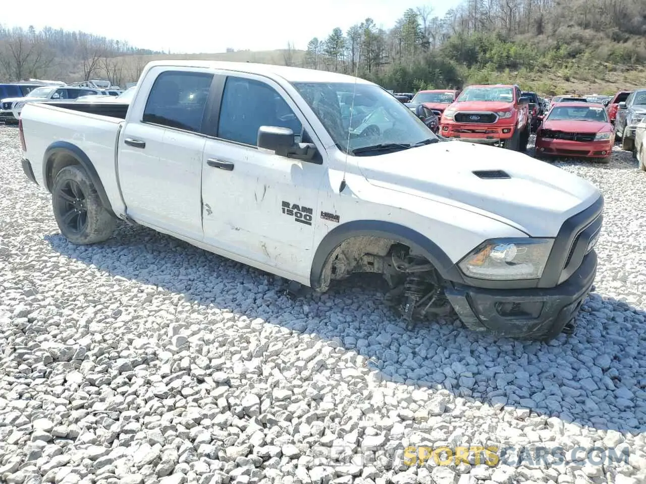 4 Photograph of a damaged car 1C6RR7LT0NS159177 RAM 1500 2022
