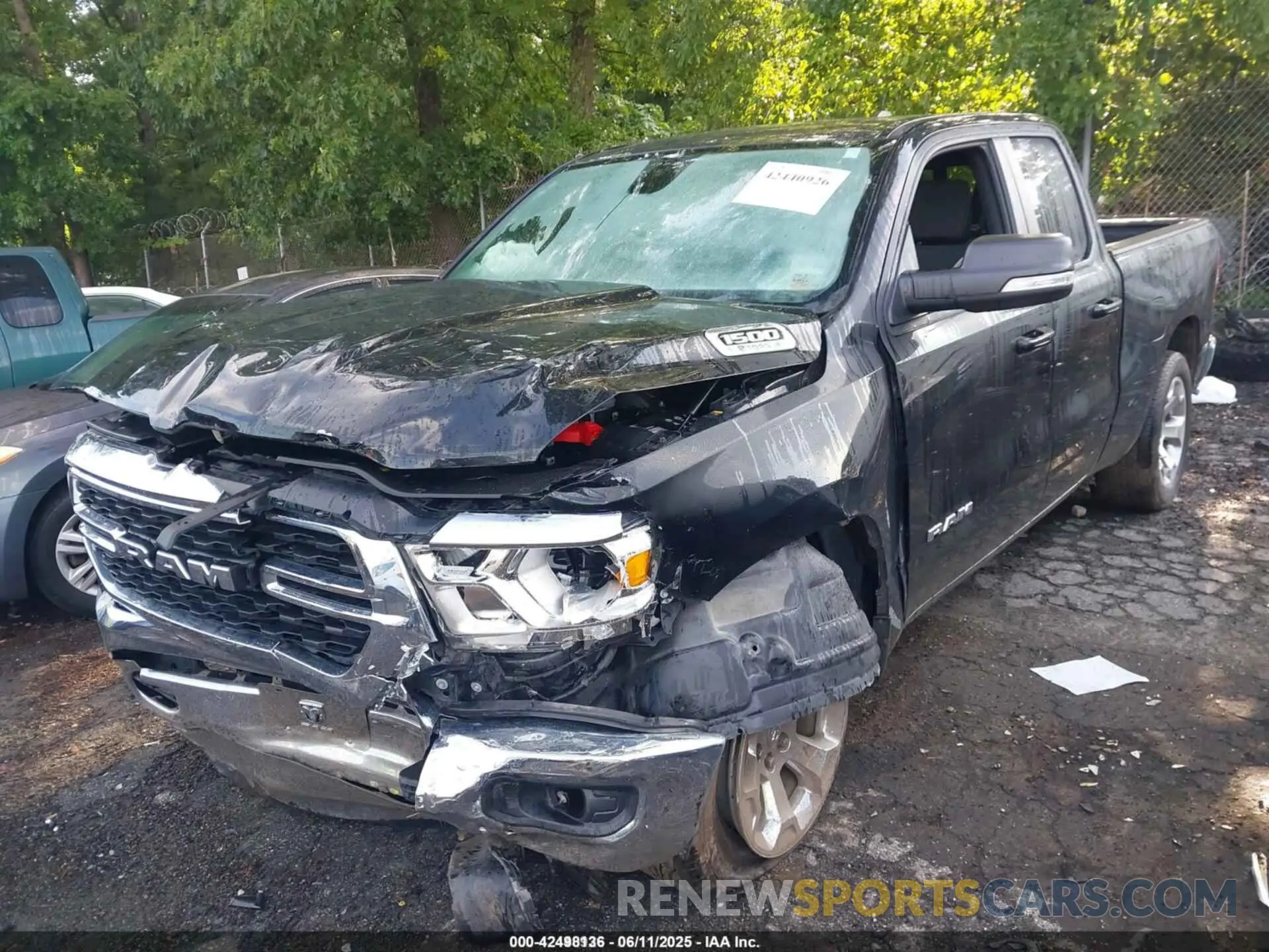 6 Photograph of a damaged car 1C6RREBG0NN218347 RAM 1500 2022