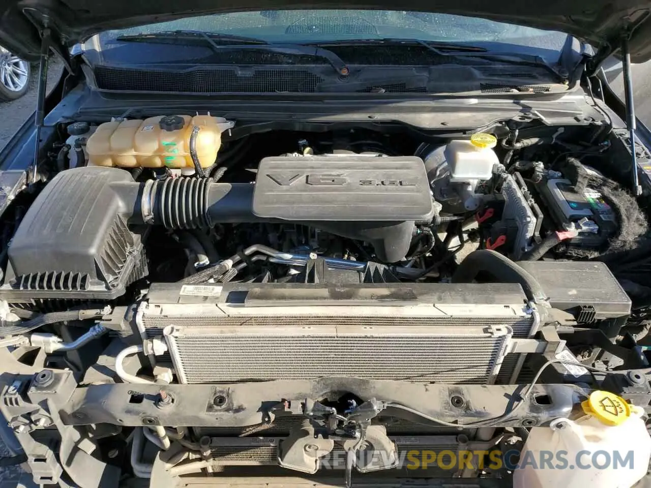 11 Photograph of a damaged car 1C6RREBG0NN372959 RAM 1500 2022