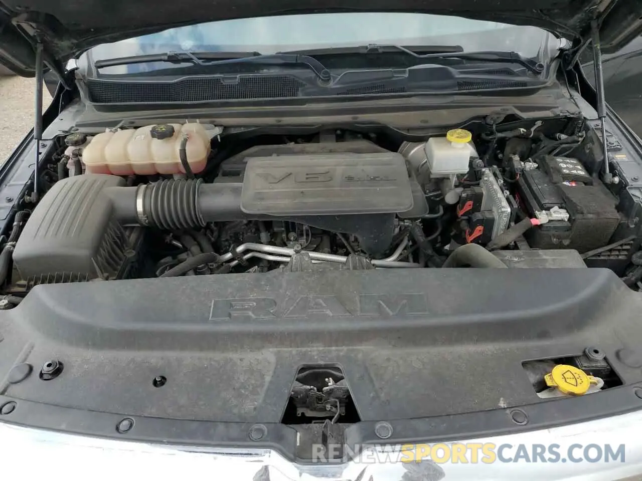 11 Photograph of a damaged car 1C6RREBG1NN273972 RAM 1500 2022