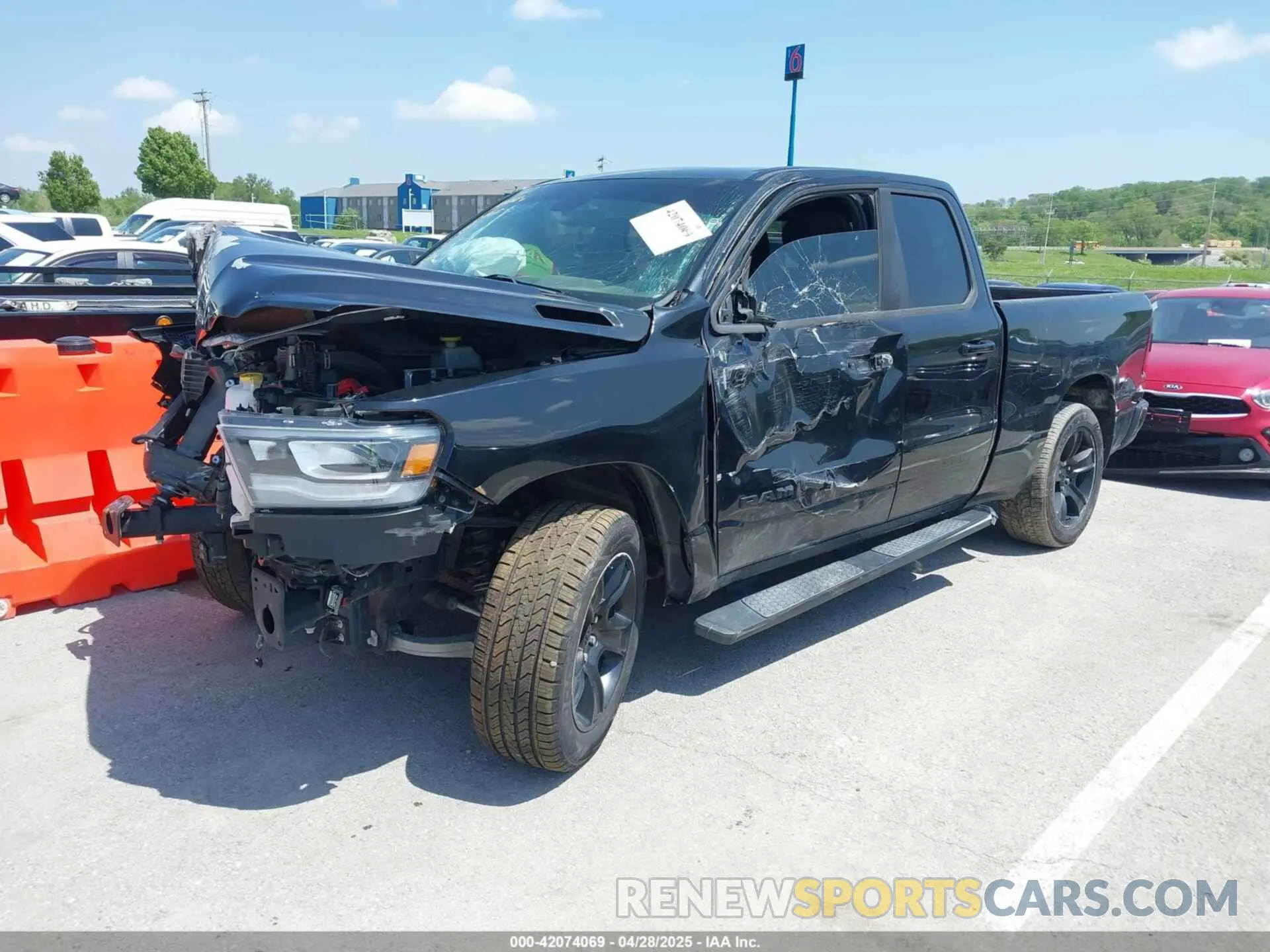 2 Photograph of a damaged car 1C6RREBG2NN122445 RAM 1500 2022