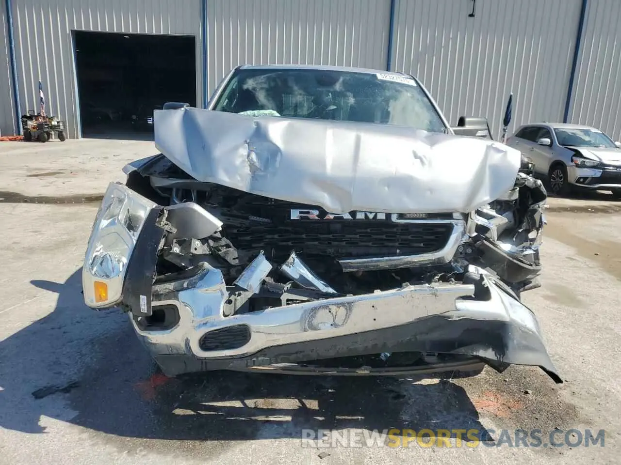 5 Photograph of a damaged car 1C6RREBG3NN373121 RAM 1500 2022