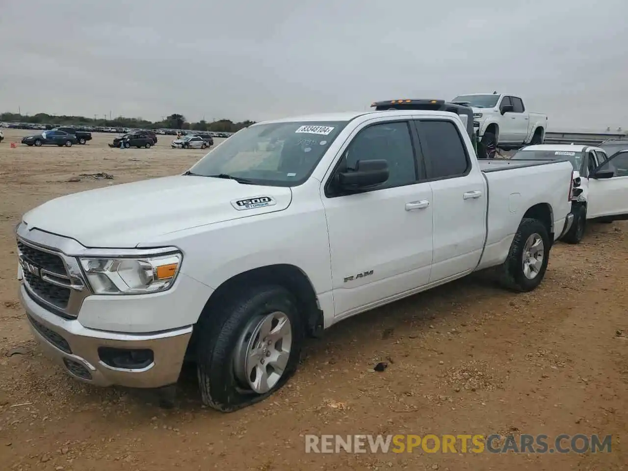 1 Photograph of a damaged car 1C6RREBG7NN273085 RAM 1500 2022