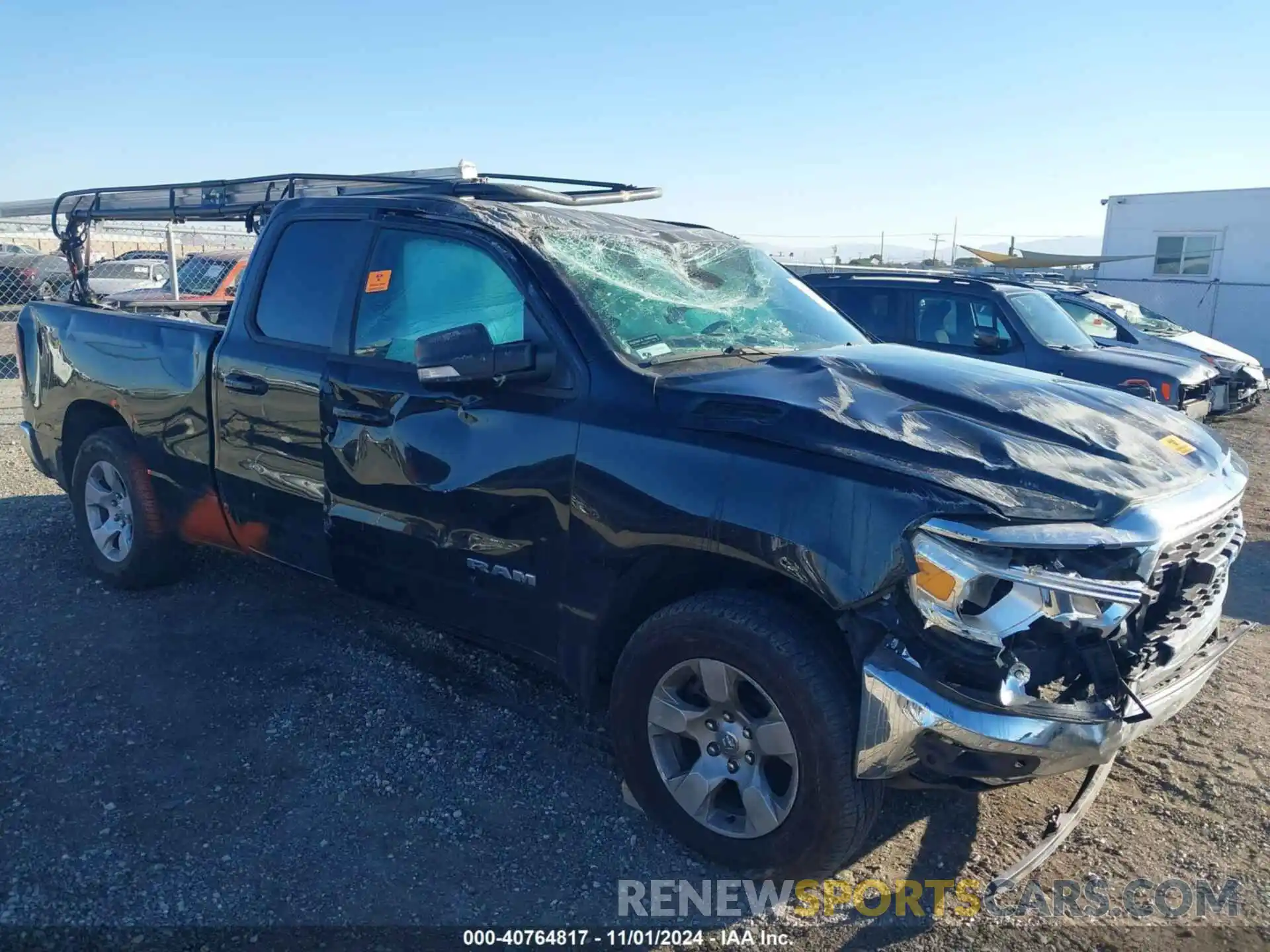 1 Photograph of a damaged car 1C6RREBG7NN451903 RAM 1500 2022