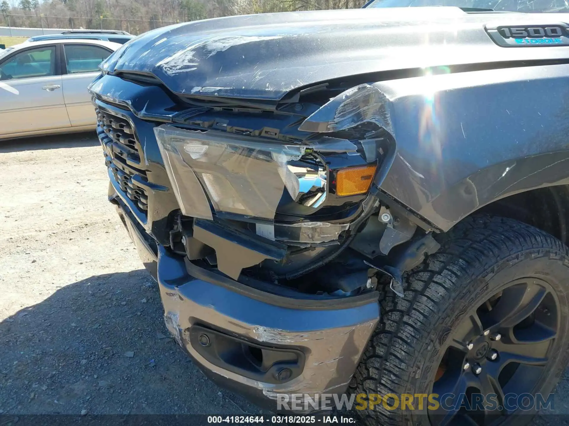 13 Photograph of a damaged car 1C6RREBG8NN398788 RAM 1500 2022