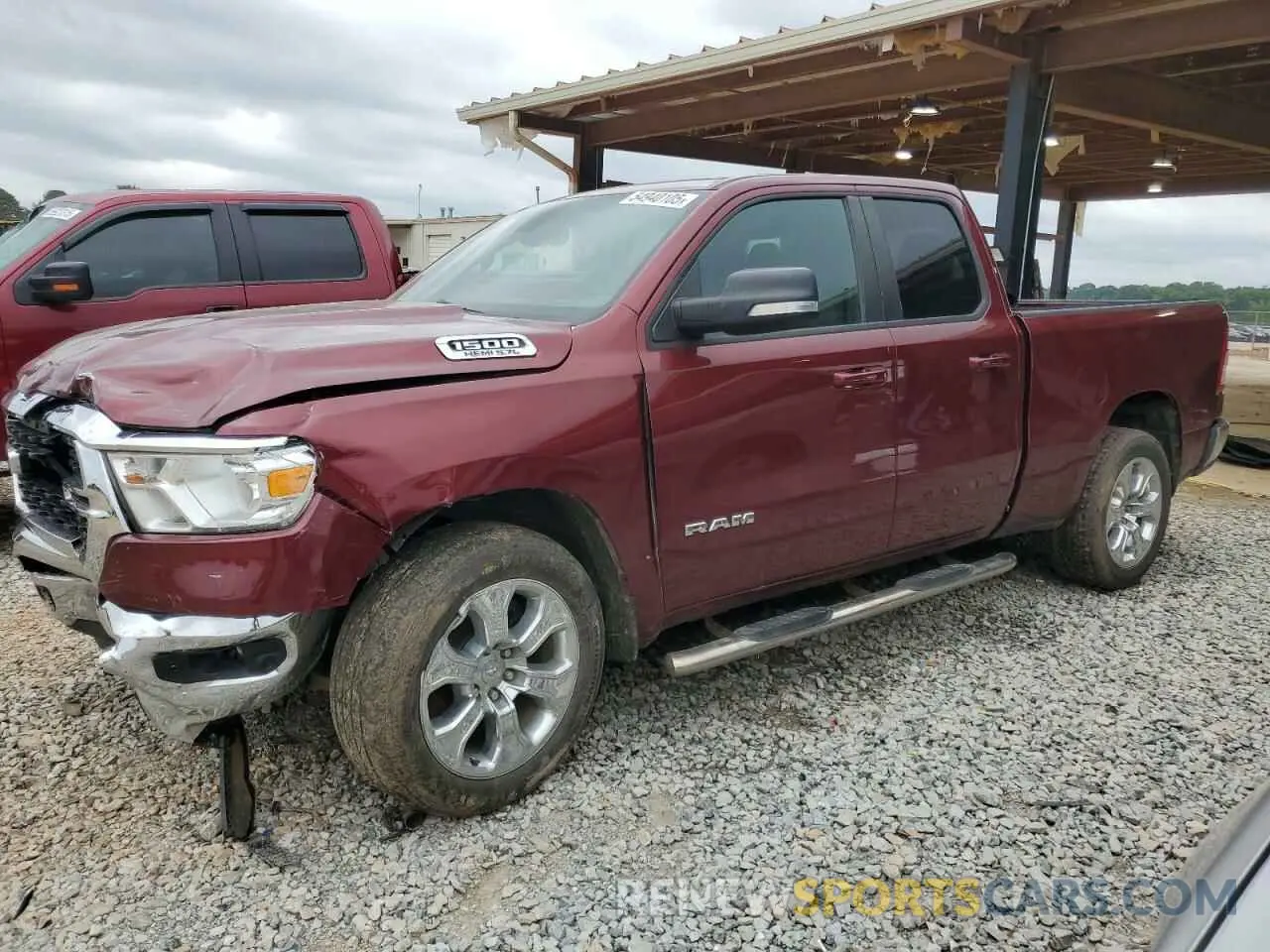 1 Photograph of a damaged car 1C6RREBT0NN125521 RAM 1500 2022