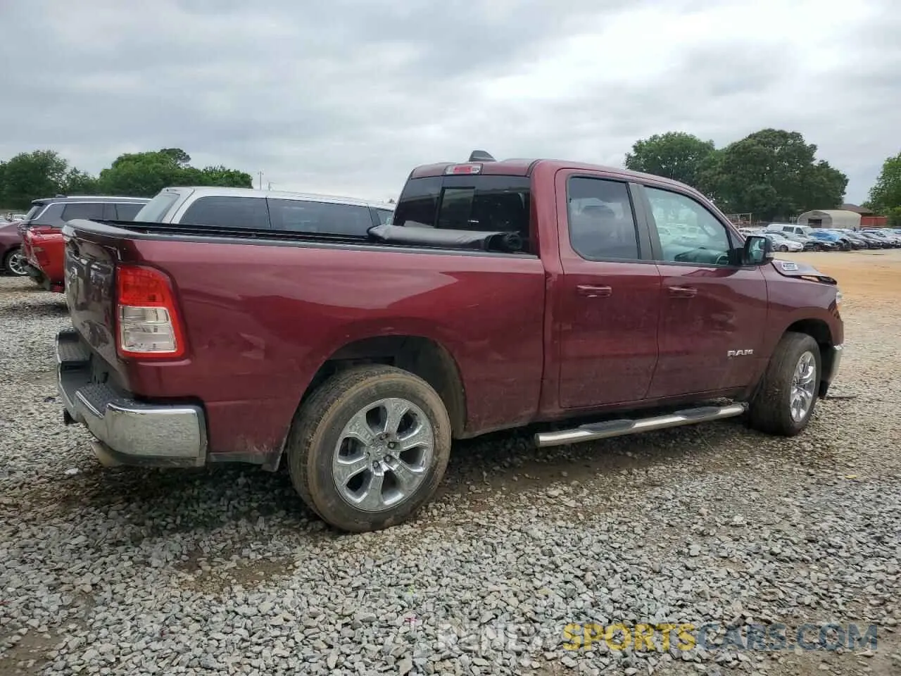 3 Photograph of a damaged car 1C6RREBT0NN125521 RAM 1500 2022