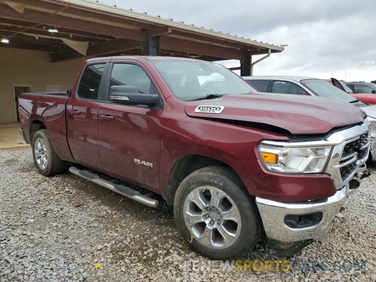 4 Photograph of a damaged car 1C6RREBT0NN125521 RAM 1500 2022