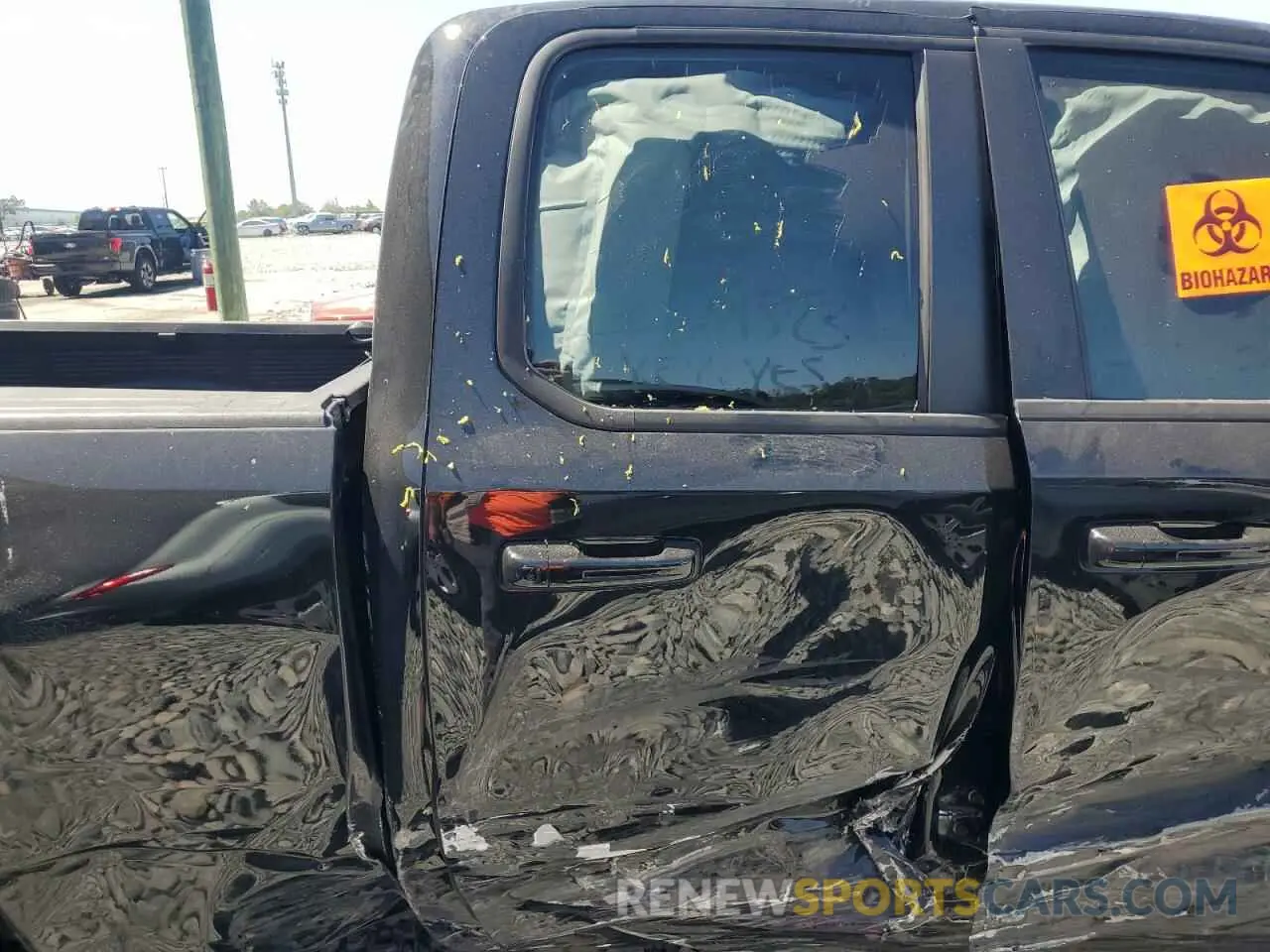 10 Photograph of a damaged car 1C6RREBT1NN201523 RAM 1500 2022