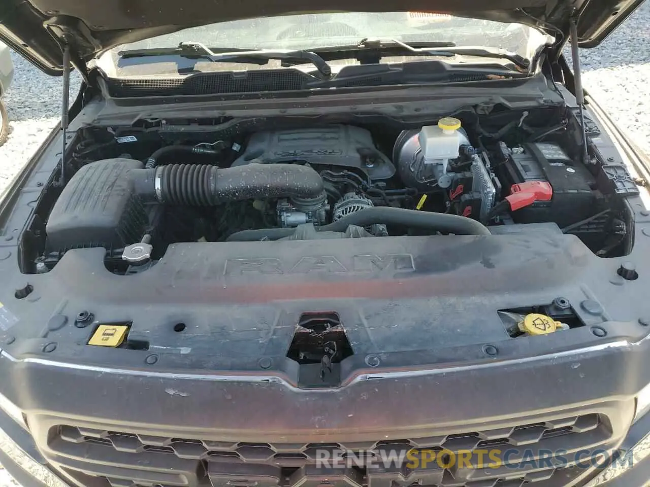 11 Photograph of a damaged car 1C6RREBT1NN201523 RAM 1500 2022