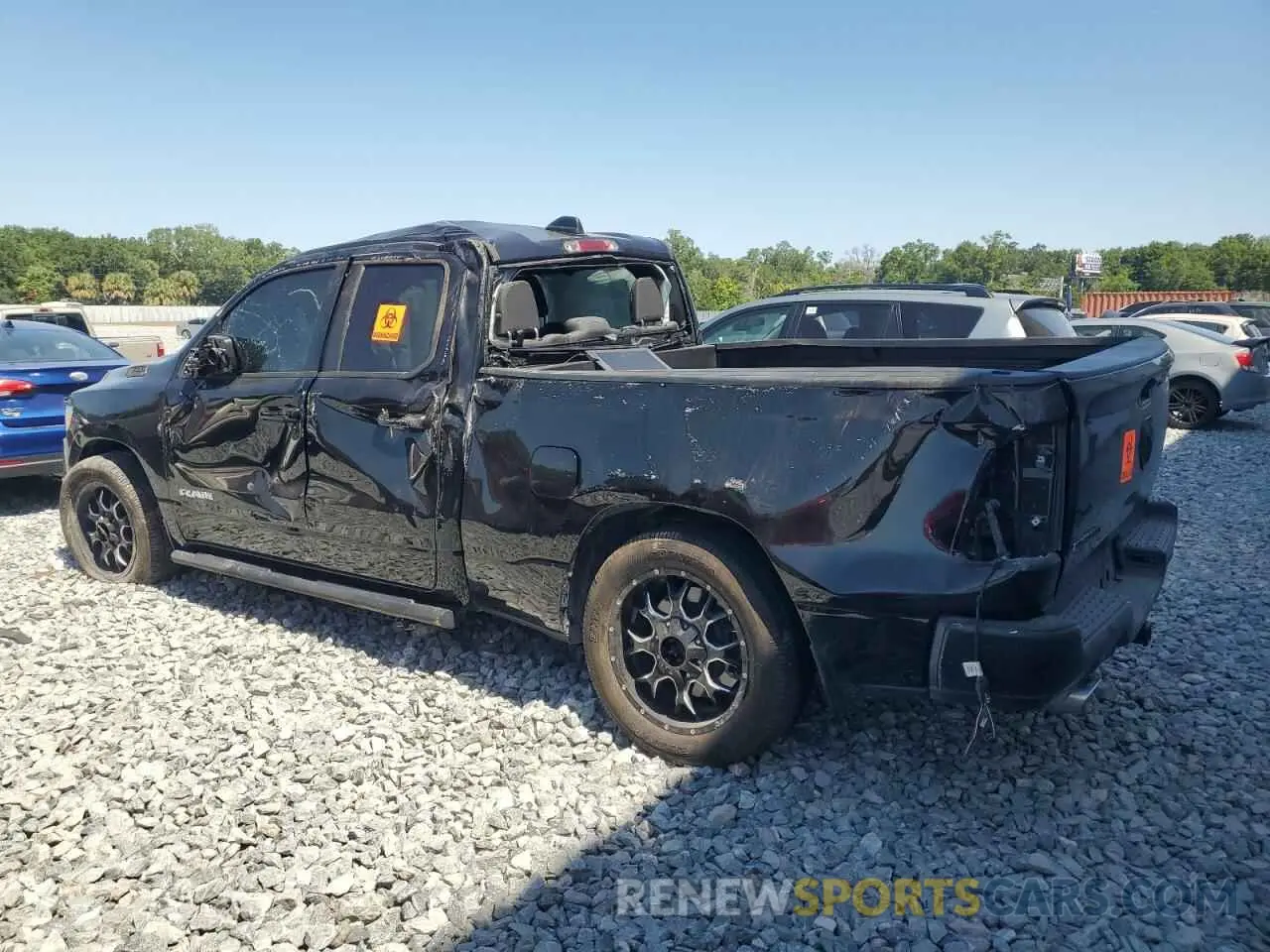2 Photograph of a damaged car 1C6RREBT1NN201523 RAM 1500 2022