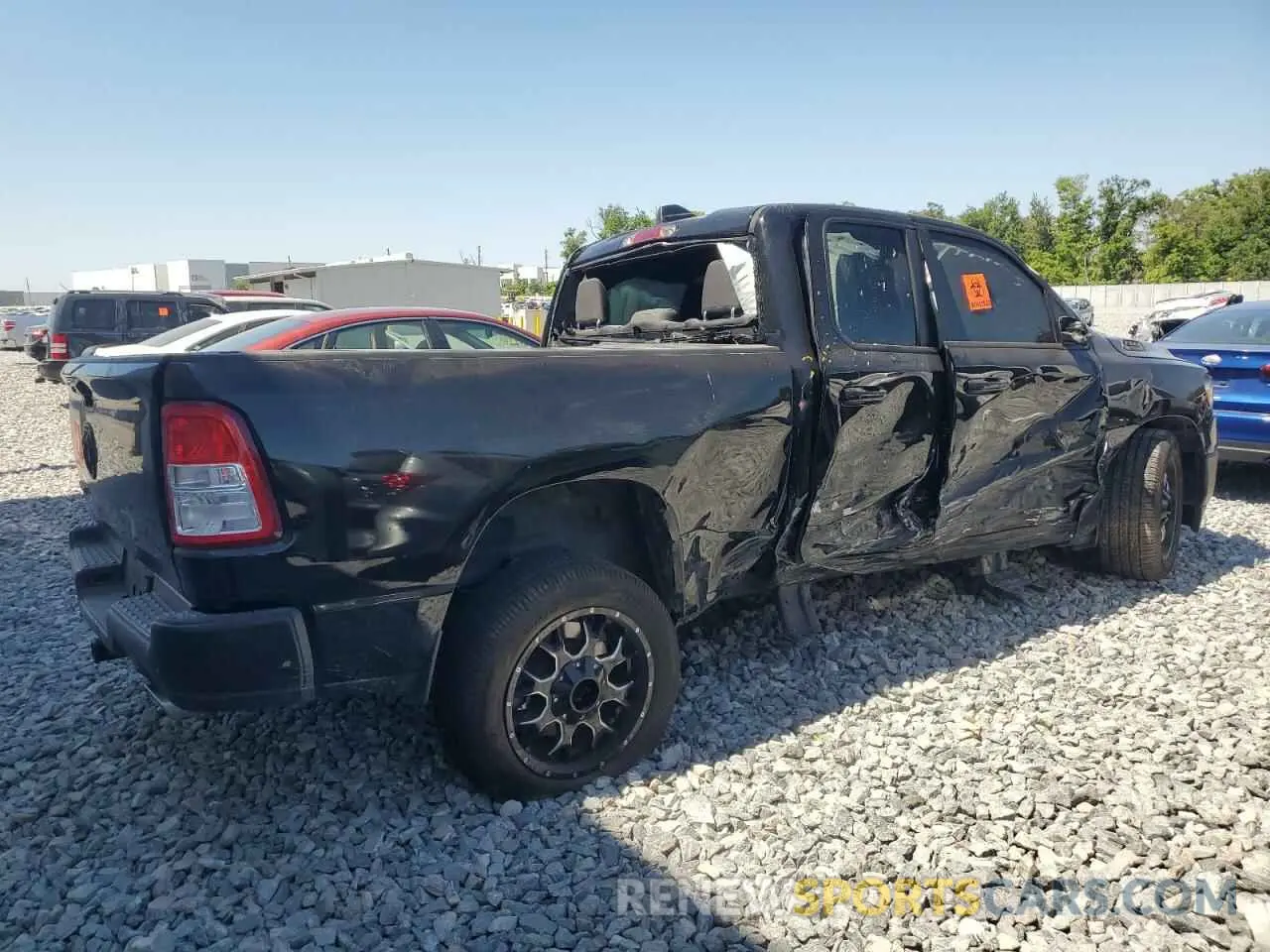 3 Photograph of a damaged car 1C6RREBT1NN201523 RAM 1500 2022