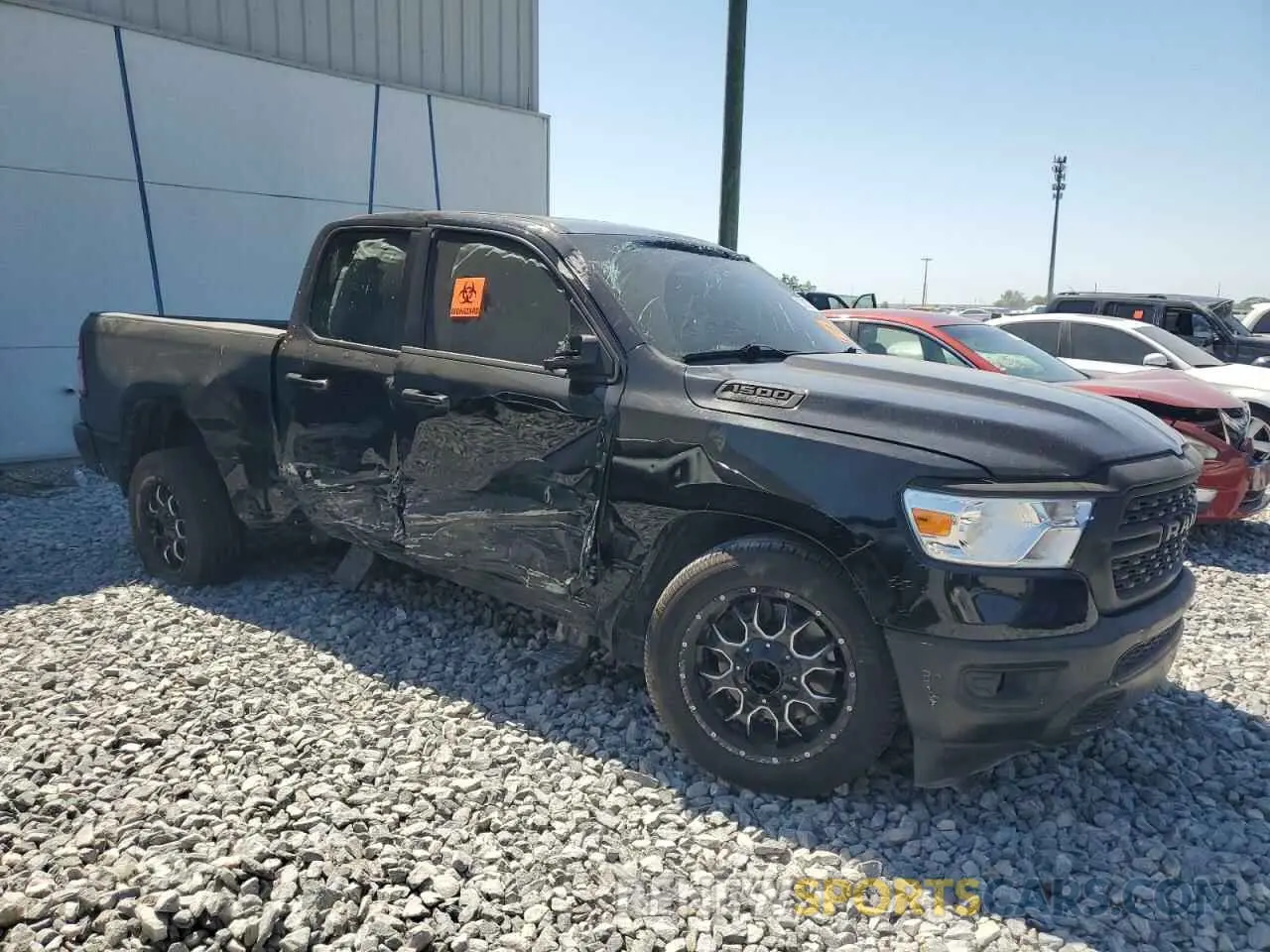 4 Photograph of a damaged car 1C6RREBT1NN201523 RAM 1500 2022