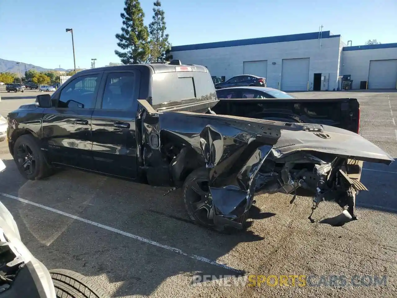 2 Photograph of a damaged car 1C6RREBT1NN276027 RAM 1500 2022