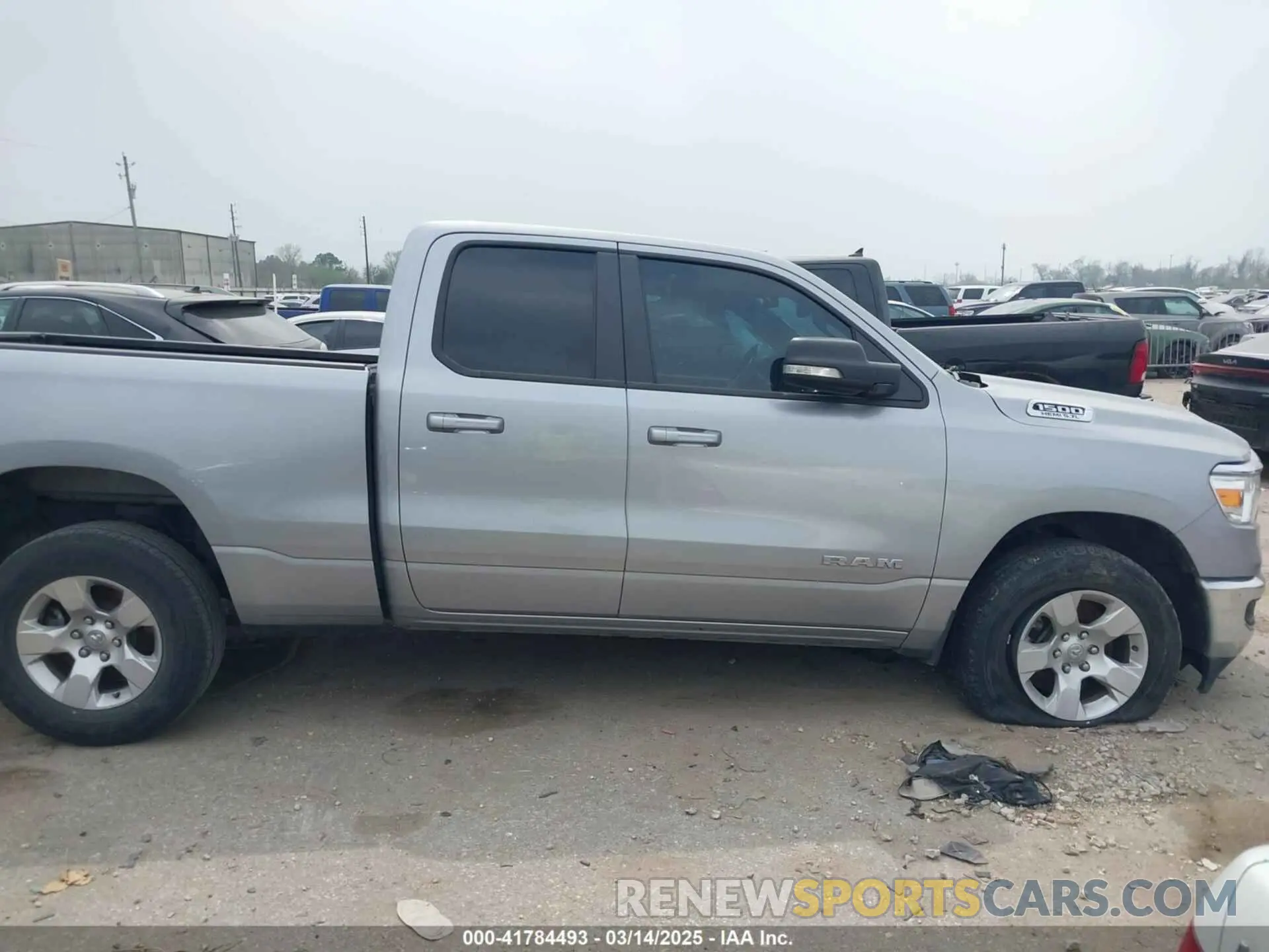 13 Photograph of a damaged car 1C6RREBT2NN228066 RAM 1500 2022