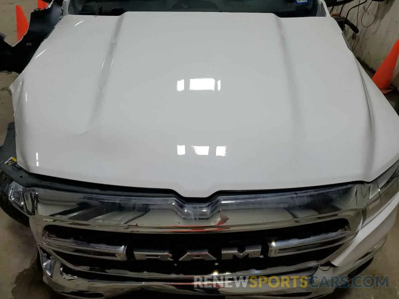 11 Photograph of a damaged car 1C6RREBT3NN124878 RAM 1500 2022