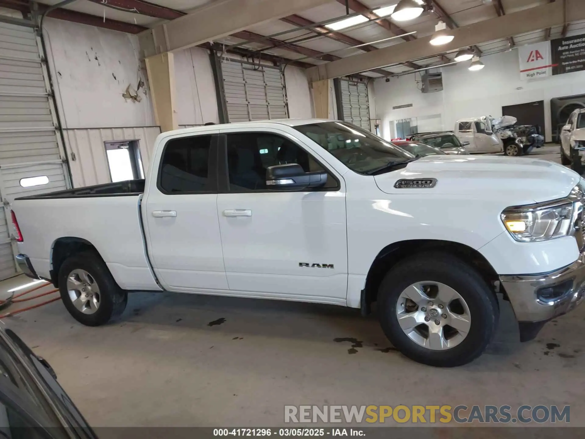 13 Photograph of a damaged car 1C6RREBT7NN104956 RAM 1500 2022