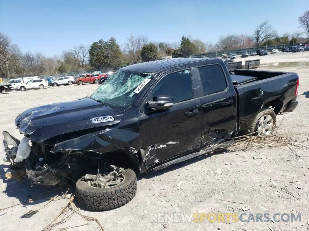 1 Photograph of a damaged car 1C6RREBT7NN127136 RAM 1500 2022