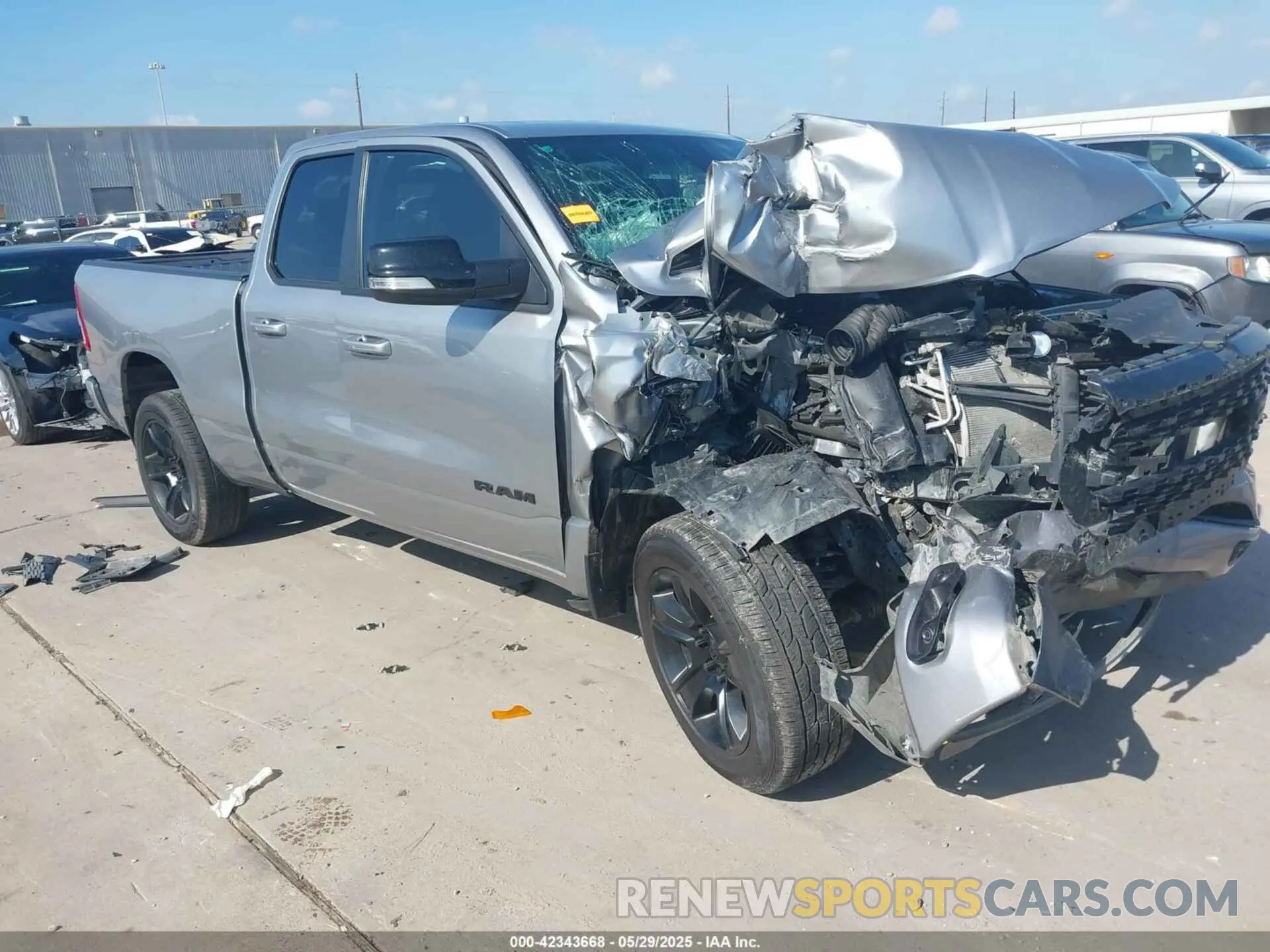 1 Photograph of a damaged car 1C6RREBT7NN399119 RAM 1500 2022