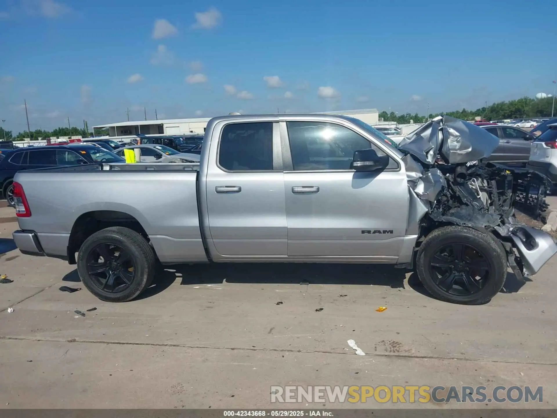 12 Photograph of a damaged car 1C6RREBT7NN399119 RAM 1500 2022