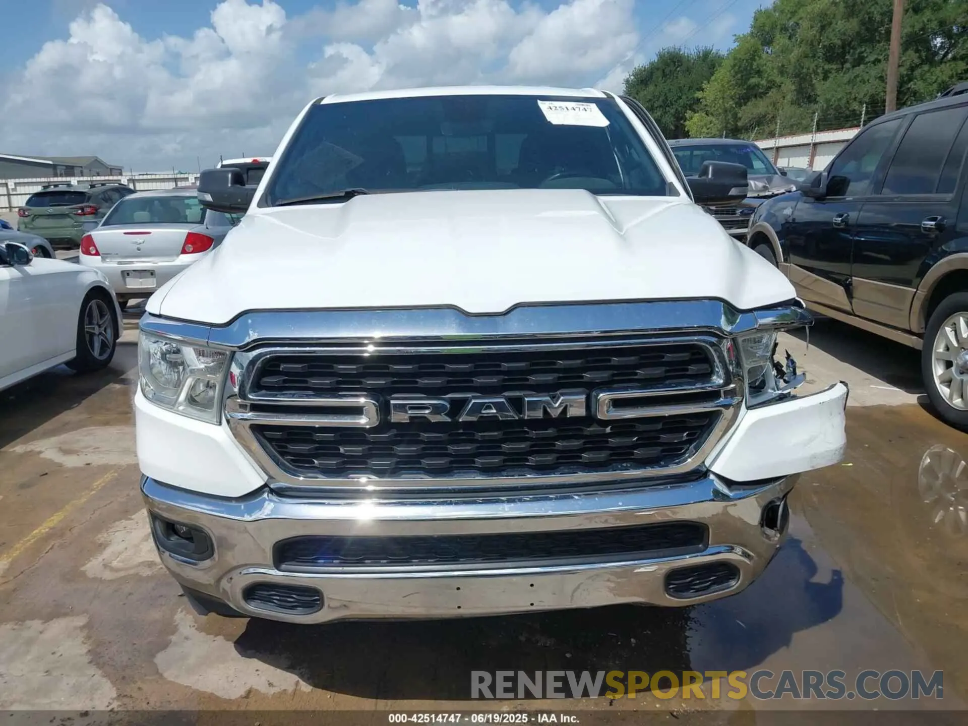 13 Photograph of a damaged car 1C6RREBT8NN190343 RAM 1500 2022